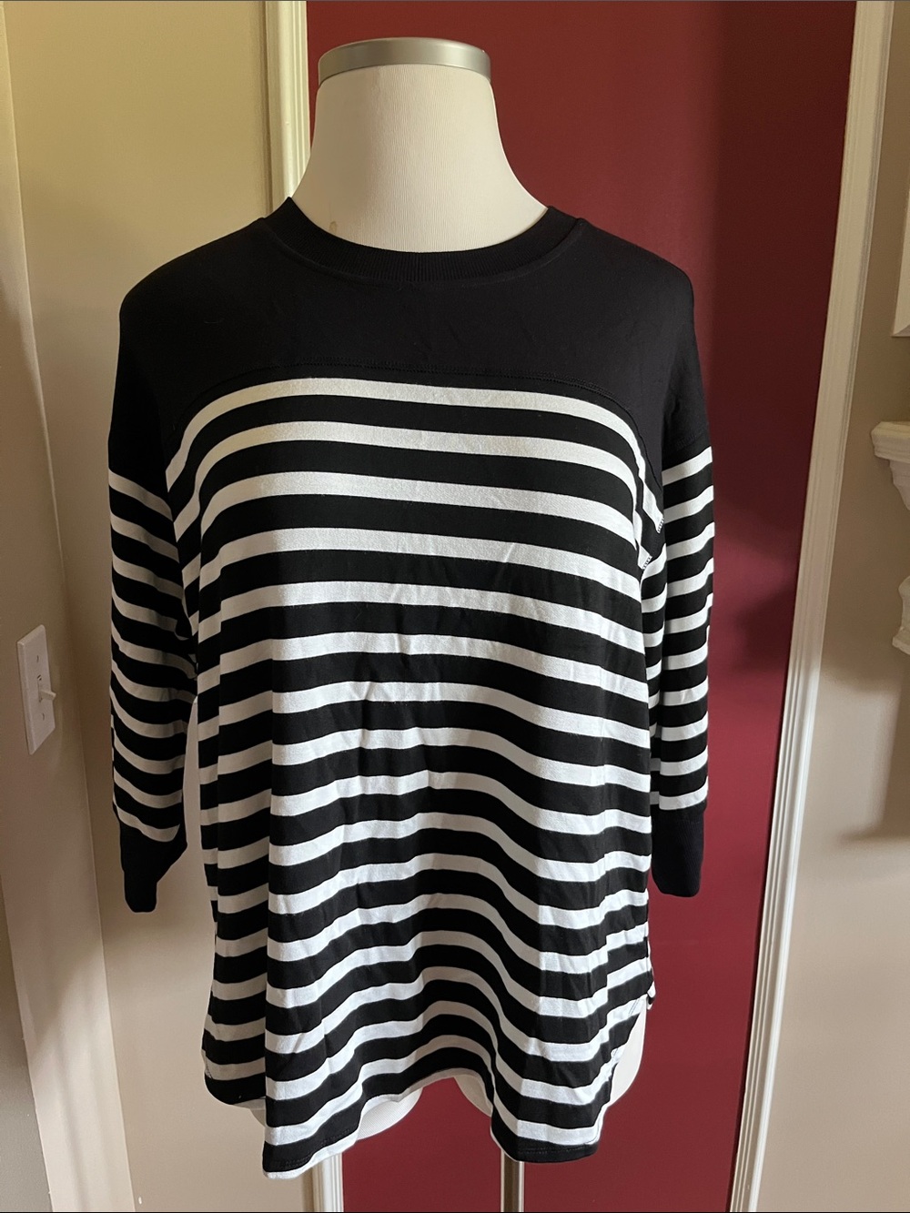 Classic 3/4 sleeve black and white shirt.